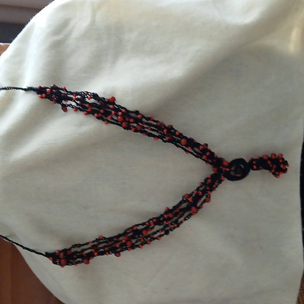 Huayruro crochet Necklace. NWOT.